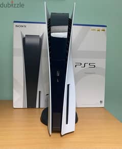 PS5 with 2 controllers and other accessories at a perfect condition
