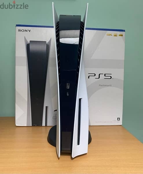 PS5 with 2 controllers and other accessories at a perfect condition 0