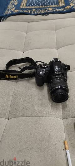 للبيع كاميرا نيكون D3100 0