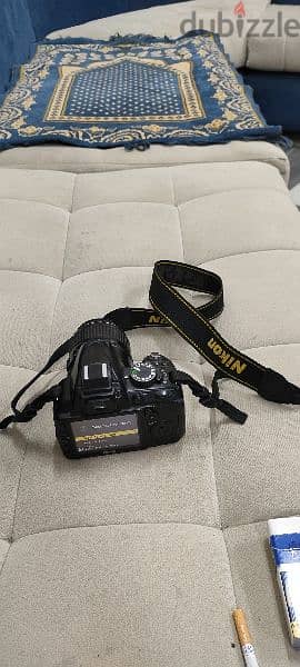 للبيع كاميرا نيكون D3100 4