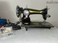 ماكينة خياطة ستينجر (stinger sewing machine) 0