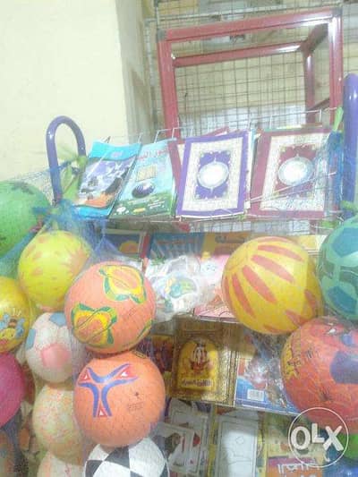 ماكينه تصوير لعب اطفال ادوات مكتبيه بعض الاكسسوارات و الدهب الصينى شمع
