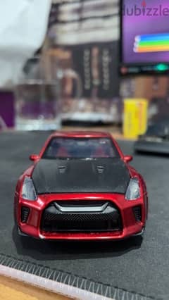 nisan gtr r35 car toy with flashing headlights and drift sounds 0