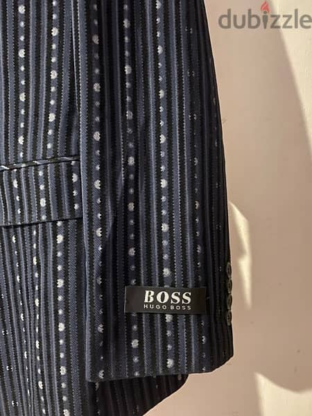 بدلة Hugo Boss صناعة إيطالية limited edition  مقاس ٥٠ بنطلون مقاس ٣٤ 1