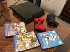 PlayStation 4 black with 2 original controllers very good  condition
