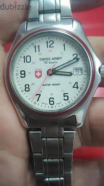ساعة سويسرية أصلية بحالة الجديدة 1