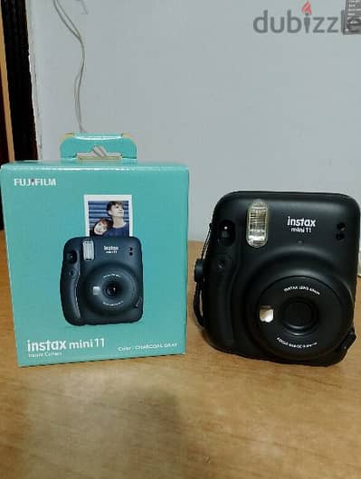fujifilm instax mini 11 camera with a case