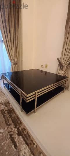 stainless steel and glass table