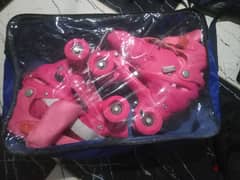 Pink roller skates never worn brand new from amarica 0