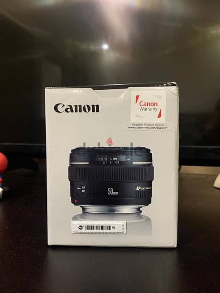 canon lens 50mm f/1.4 used opened box not used عدسة كانون 1
