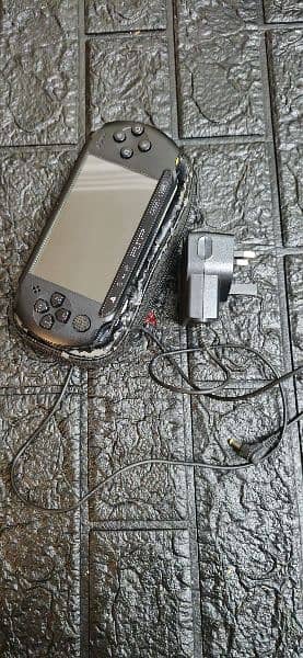 Sony Portable Playstation,  PSP Street E1000 1