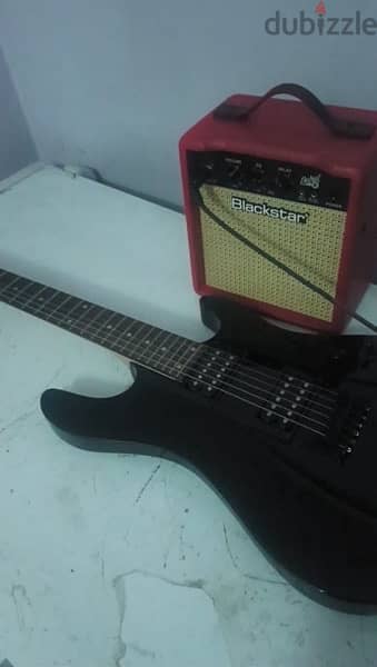 cort kx100 black electric guitar with blackstar amp 0