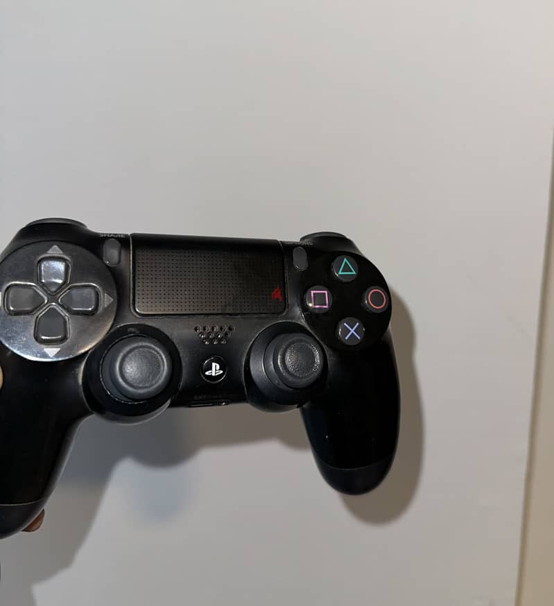 Extremely clean ps4 slim 500gb with original controller 1
