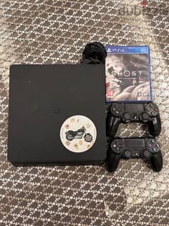 ps4 slim 1tb with 2 orginal  controllers and ghosts of tsushima game 0