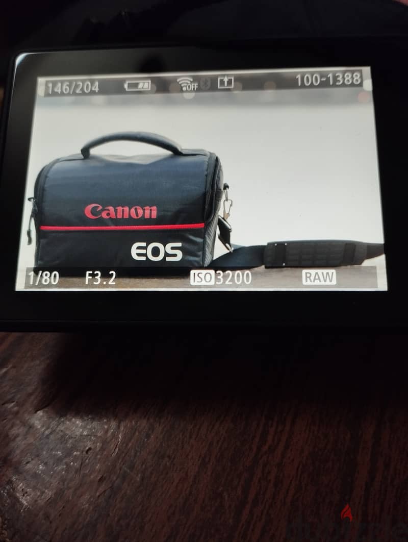 Canon 250D+lens18-55+lens50ml،اتعمل بيها اتنين سيشن فقط. . 1