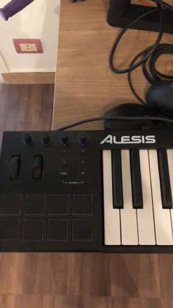 Alesis v49 49-key usb keyboard & pad controller 1
