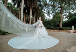 فستان زفاف هاند ميد القماش فرنساوى ديل تلاته متر.