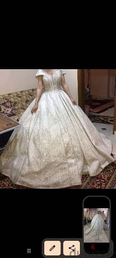 فستان زفاف اوف شولدر ينفع لغير المحجبات ويتقفل لو محجبه ايجار2500