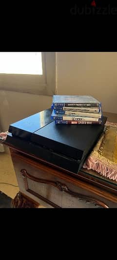 Playstation 4 Used + 4 Games 0