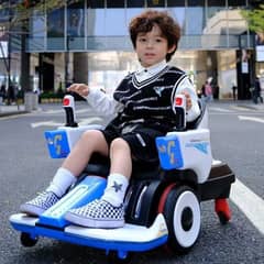 عربية اطفال بالكهرباء 7 عجلات بتلف 360 درجة