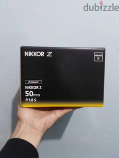 Nikon NIKKOR Z 50mm  F 1.8 للبيع عدسة  العدسه جديده لم تفتح ولم تستعمل 0