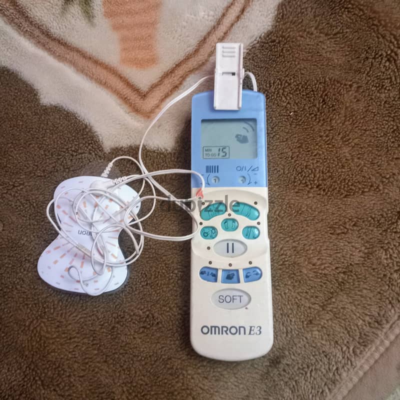 electronic pulse stimulator ماركة OMRON ياباني جهاز 0