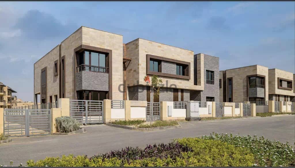 Townhouse for sale in the Origamy Gardens phase in Taj City Compound 1