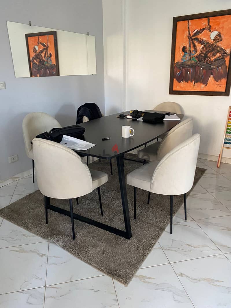 Black wooden and steel dining table (2m x 1m) plus 6 beige chairs 0