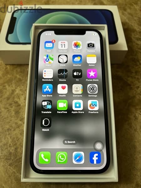I phone 12 64 GB with its box 2