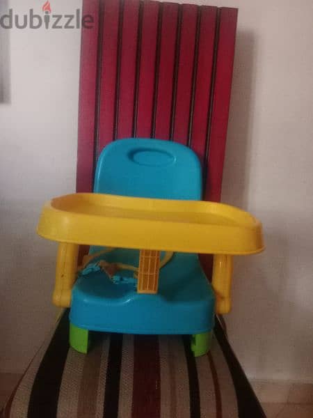 كرسي اطفال يثبت علي كرسي كبير . . . حالته ممتازه 1