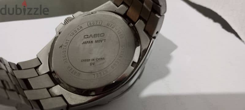 wristwatch   CASIO water resist 100M 3