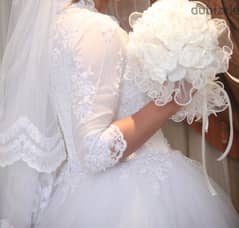 wedding dress with very good condition used once with veil