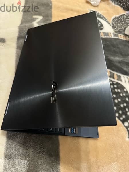 ASUS ZenBook Flip 13 Ultra Slim Convertible Laptop, 13.3” OLED FHD 9