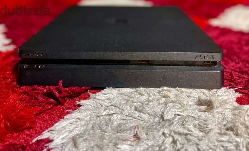 PS4 Slim 1TB, with 2 Controllers 1
