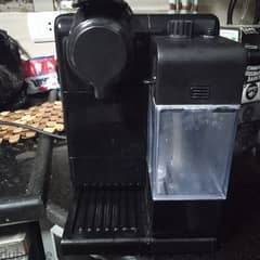 ماكينة قهوة نيسبريسسو ديلونجي مع خزان للحليب 0