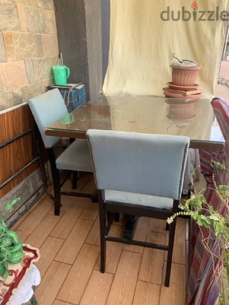 Used Dining table with 2 Blue chairs forsale 1