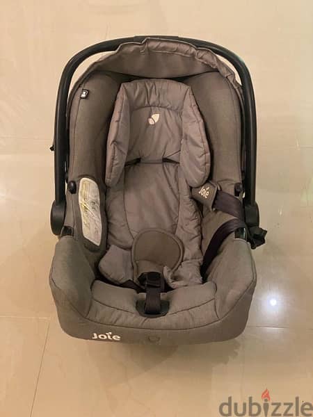 joie car seat 1st stage used in very good condition , gray color 1