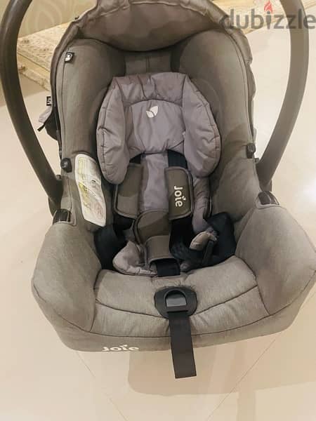 joie car seat 1st stage used in very good condition , gray color 5