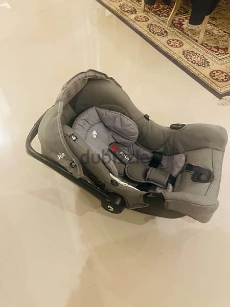 joie car seat 1st stage used in very good condition , gray color 6