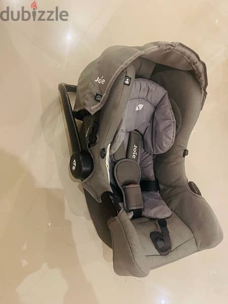 joie car seat 1st stage used in very good condition , gray color 7