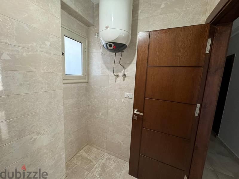 شقة للايجار الحي التامن الشيخ زايد بالمطبخ - apartment for rent 5