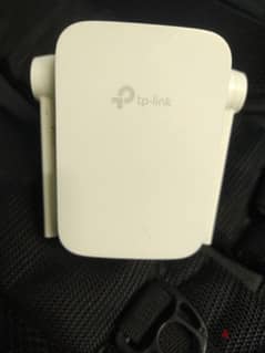 TP-Link WiFi Range Extender 300Mps بحالة جيدة جدا ، استعمل مرات معدودة