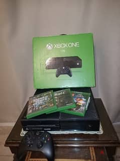 Xbox one with 3 games ( GTA 5 , Fallout 4 , Lego Jurassic world )