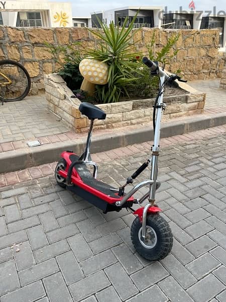 Electric scooter for adults and children - سكوتر كهربائي بحالة جيدة 1