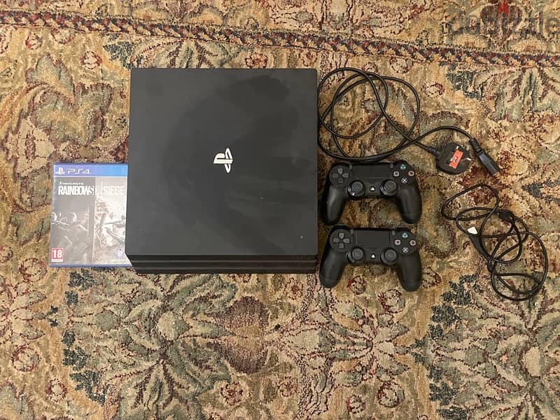 playstation 4 pro - 1TB - 2 controllers - 2games 1