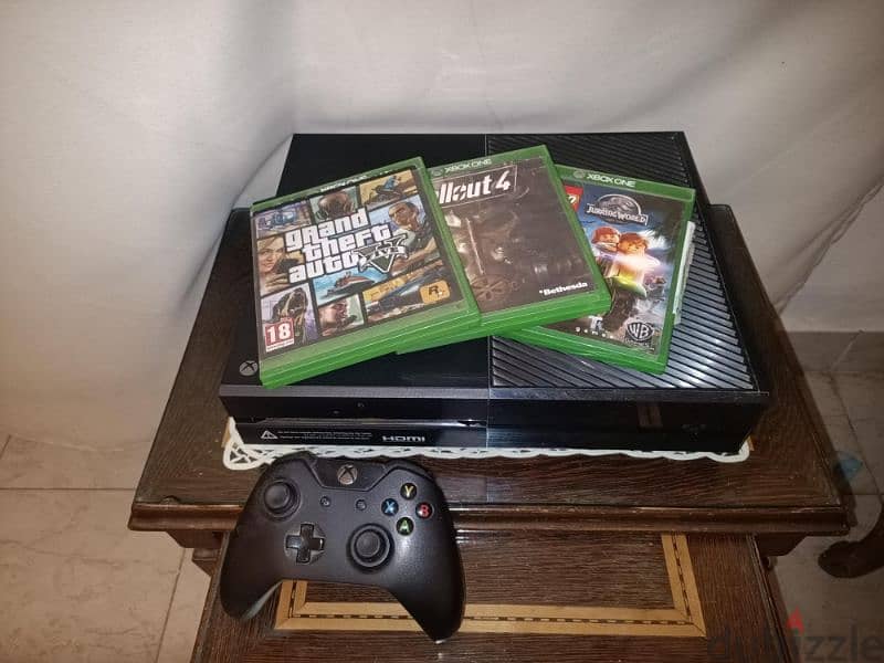 Xbox one with 3 games ( GTA 5 , Fallout 4 , Lego Jurassic world ) 1
