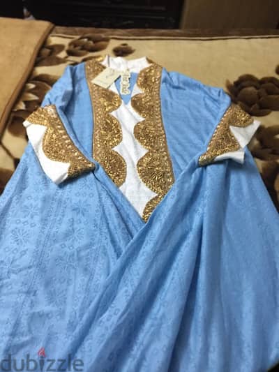 ملابس وفساتين زفاف