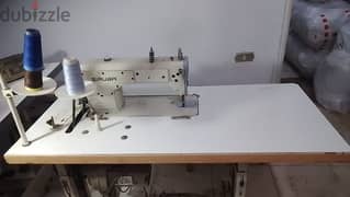 ماكينة خياطة وتفصيل
