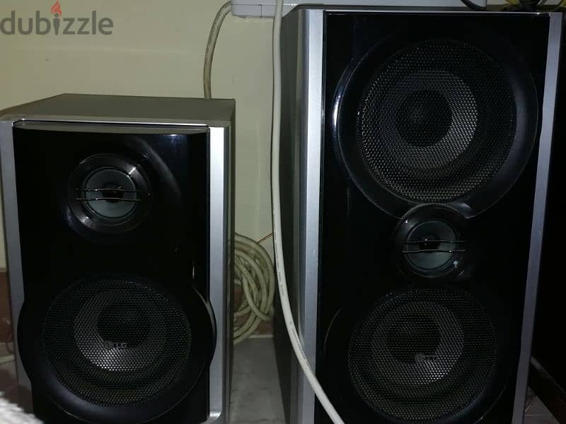 sound system lg from doha as new. with speakers 1
