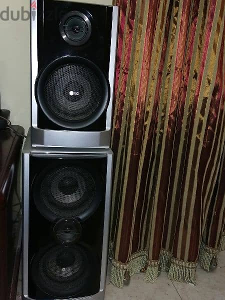 sound system lg from doha as new. with speakers 2